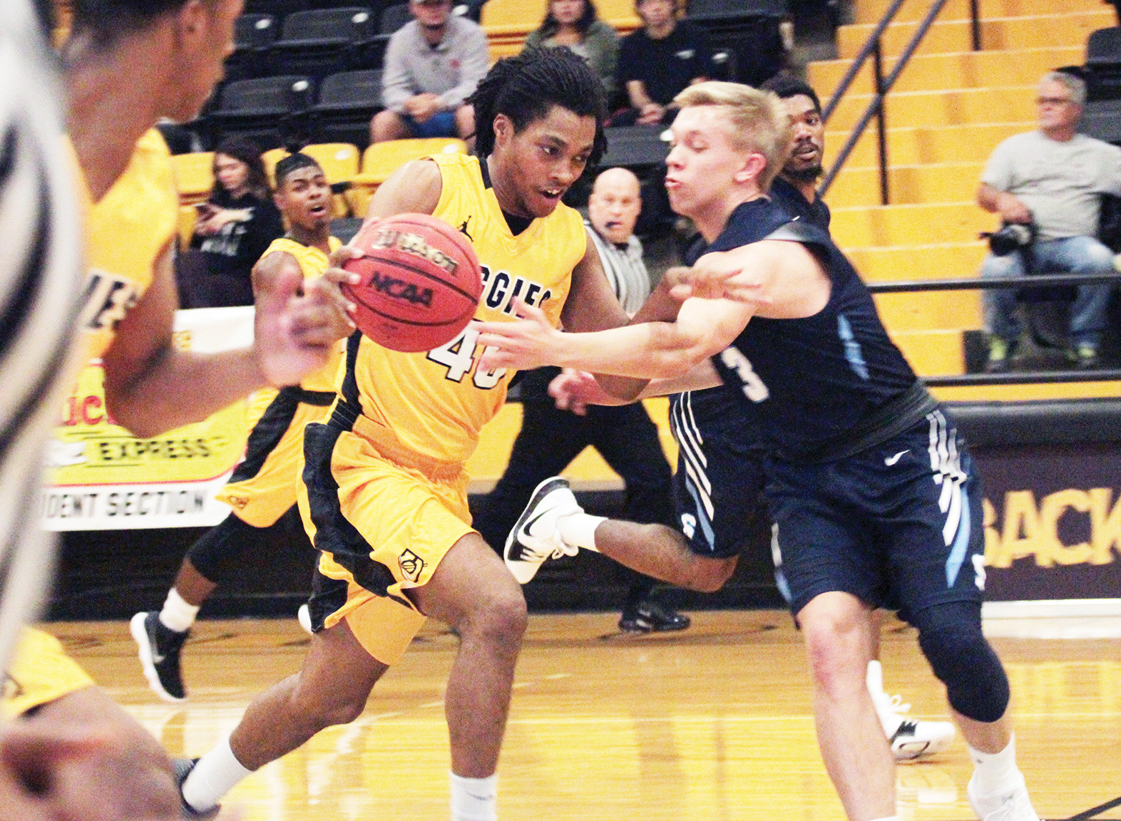 Aggie Men Win First Home Game